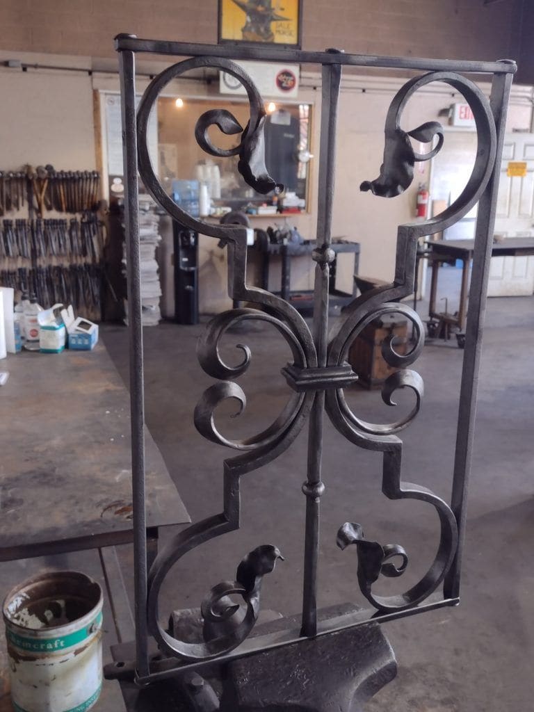 Forged scroll panel