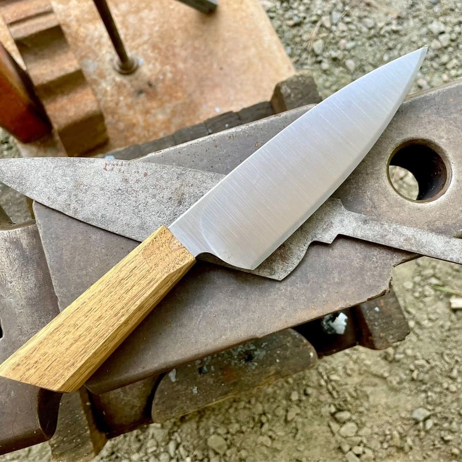 A chef knife forged in a Scott McGhee class