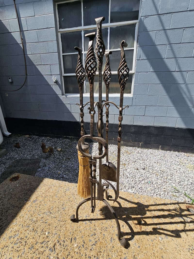A forged fireplace set on a porch