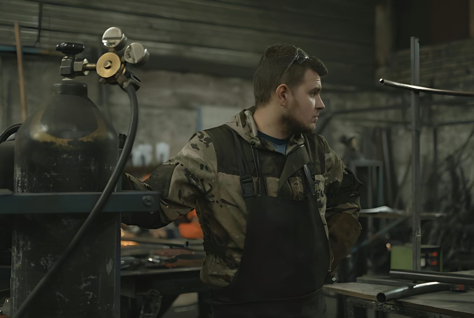 A welding student in the shop